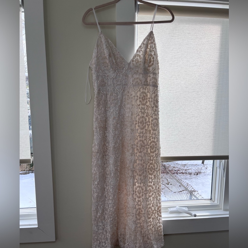 New with tags. Size 8 and 10. Express midi dress
